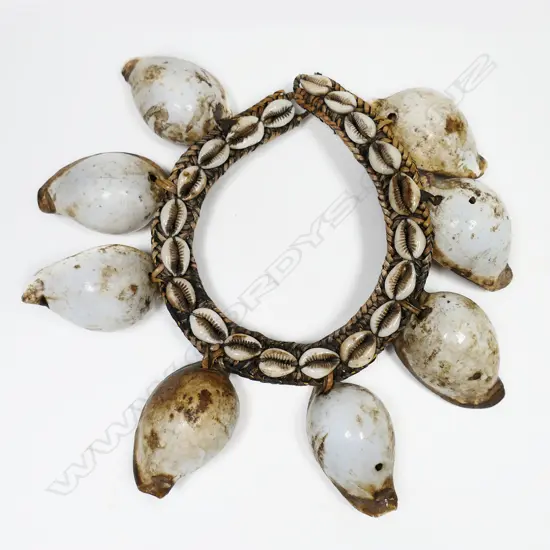 A large cowrie shell necklace,